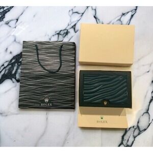 Rolex Watch Box with Black and Gold Accents